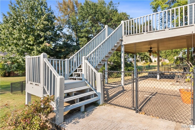 exterior space featuring ceiling fan