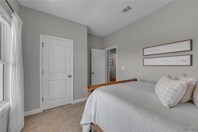 13930 Sullivan Blvd, Northport, AL 35475 - carpeted bedroom featuring baseboards and visible vents