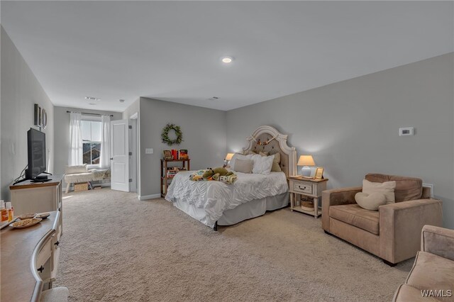 13930 Sullivan Blvd, Northport, AL 35475 - bedroom featuring visible vents, light colored carpet, and baseboards