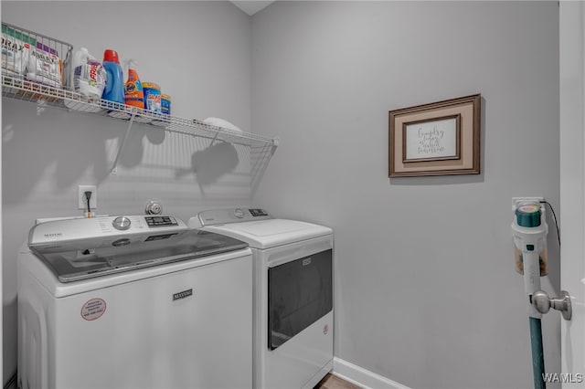 13930 Sullivan Blvd, Northport, AL 35475 - laundry room featuring independent washer and dryer, laundry area, and baseboards