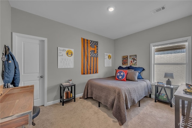 13930 Sullivan Blvd, Northport, AL 35475 - bedroom featuring light colored carpet, baseboards, and visible vents