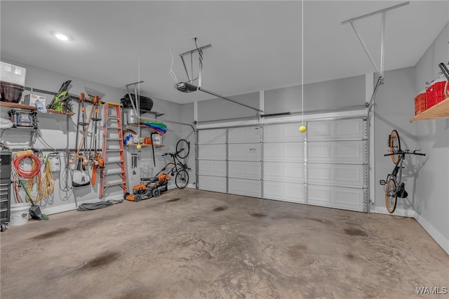 13930 Sullivan Blvd, Northport, AL 35475 - garage featuring a garage door opener