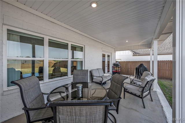 13930 Sullivan Blvd, Northport, AL 35475 - view of patio featuring outdoor dining space and fence