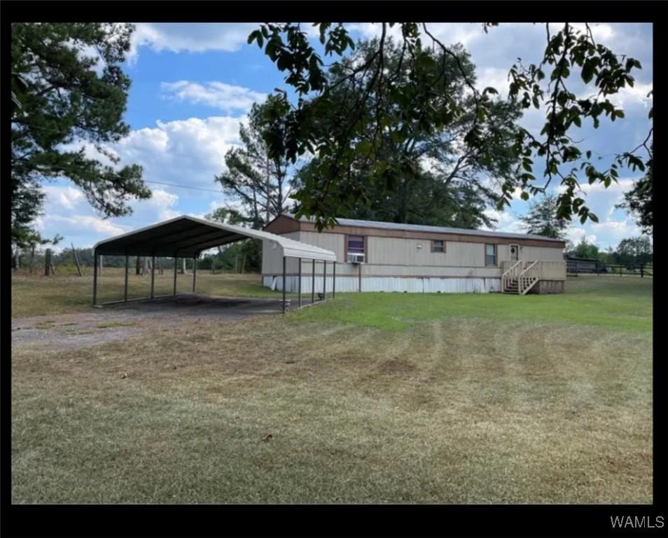 view of yard featuring a carport