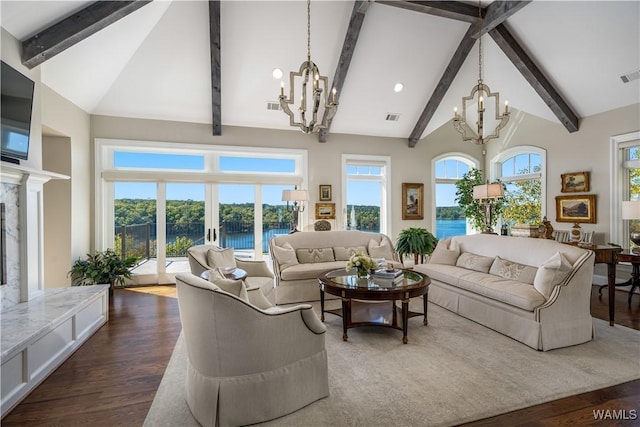 1231 Diamond Point Cir, Tuscaloosa, AL 35406 - living area featuring high vaulted ceiling, visible vents, and a chandelier