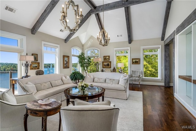 1231 Diamond Point Cir, Tuscaloosa, AL 35406 - living area with a notable chandelier, a healthy amount of sunlight, and visible vents