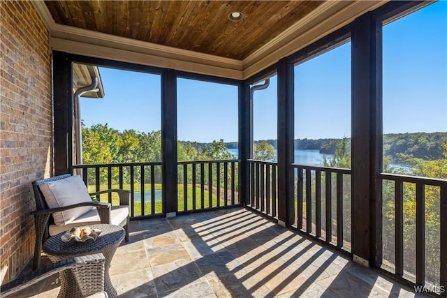 1231 Diamond Point Cir, Tuscaloosa, AL 35406 - sunroom / solarium featuring a wooded view, a water view, and a wealth of natural light