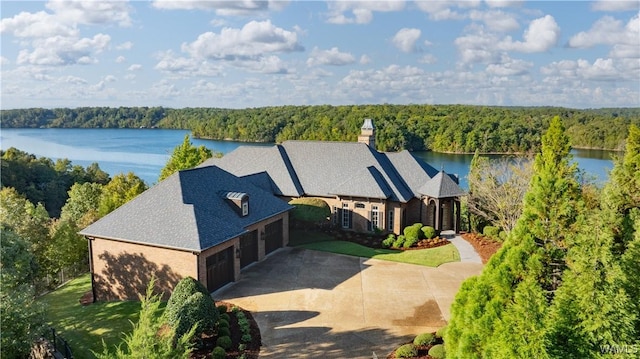 1231 Diamond Point Cir, Tuscaloosa, AL 35406 - aerial view featuring a forest view and a water view