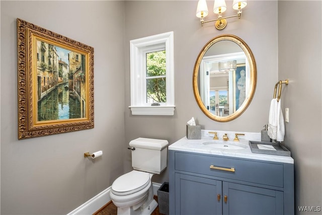 1231 Diamond Point Cir, Tuscaloosa, AL 35406 - bathroom with toilet, vanity, and baseboards