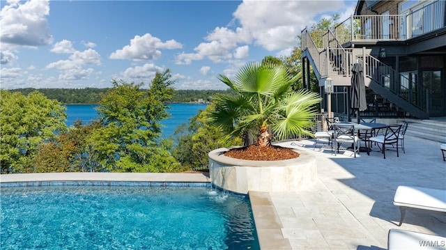 1231 Diamond Point Cir, Tuscaloosa, AL 35406 - outdoor pool featuring stairs, a patio, and a water view