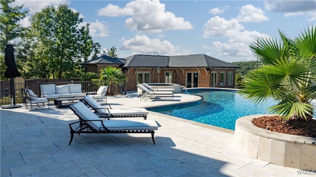 1231 Diamond Point Cir, Tuscaloosa, AL 35406 - view of pool with french doors, a hot tub, a patio, and fence