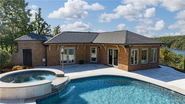 1231 Diamond Point Cir, Tuscaloosa, AL 35406 - back of property featuring a patio area, french doors, brick siding, and roof with shingles
