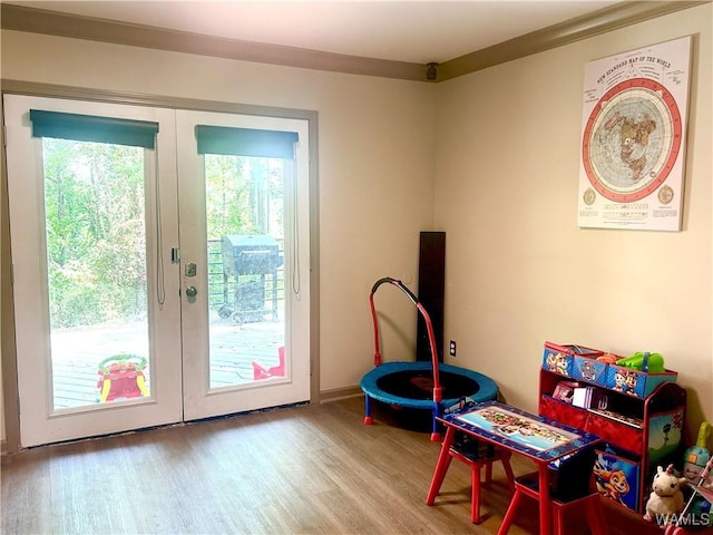 5211 Briarcliff Dr, Northport, AL 35473 - playroom featuring french doors and wood finished floors