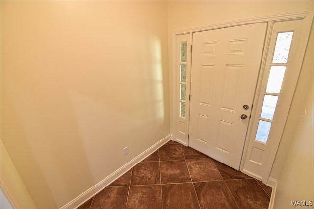 view of tiled foyer entrance