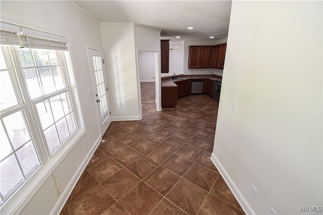 kitchen featuring stainless steel dishwasher, crown molding, dark brown cabinetry, and sink