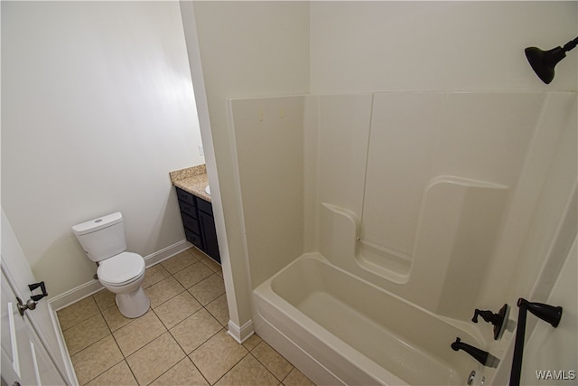 full bathroom featuring tile patterned floors, bathing tub / shower combination, vanity, and toilet