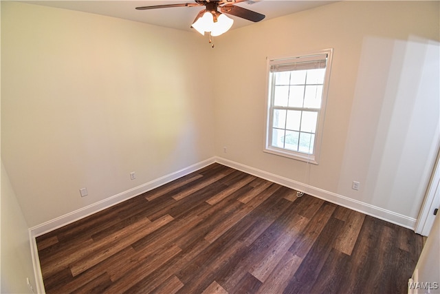 unfurnished room featuring ceiling fan and dark wood-type flooring