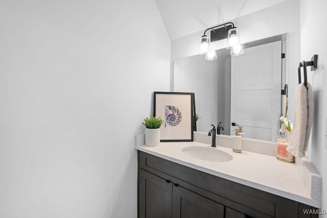 800 Red Drew Ave, Tuscaloosa, AL 35401 - bathroom with vanity and lofted ceiling