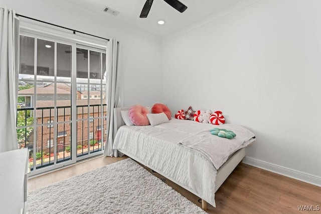 800 Red Drew Ave, Tuscaloosa, AL 35401 - bedroom featuring wood finished floors, access to exterior, a ceiling fan, ornamental molding, and recessed lighting