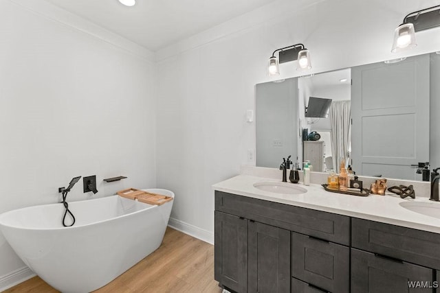 800 Red Drew Ave, Tuscaloosa, AL 35401 - full bath featuring double vanity, a soaking tub, wood finished floors, and recessed lighting