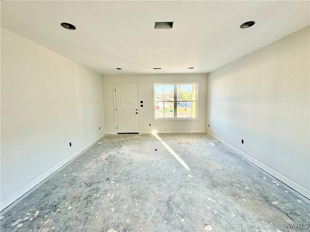 empty room with baseboards