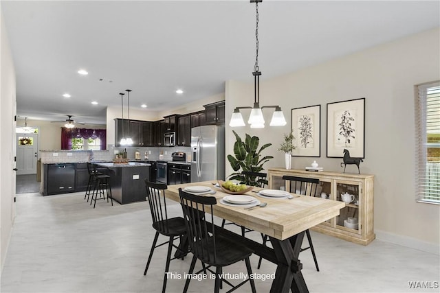 9437 Crete Cir, Tuscaloosa, AL 35406 - dining room with recessed lighting and a chandelier