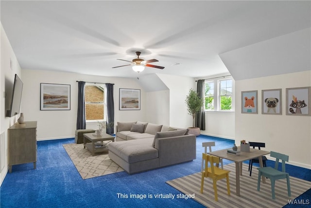 9437 Crete Cir, Tuscaloosa, AL 35406 - carpeted living area with a ceiling fan and baseboards