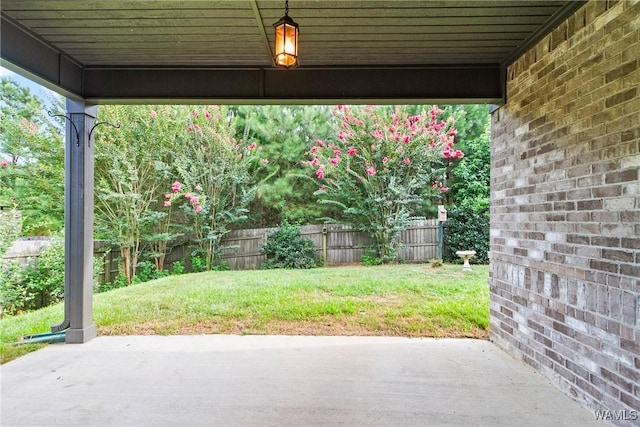 9437 Crete Cir, Tuscaloosa, AL 35406 - fenced backyard featuring a patio