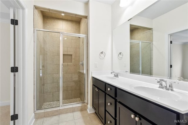 9437 Crete Cir, Tuscaloosa, AL 35406 - full bathroom featuring double vanity, a shower stall, and tile patterned floors