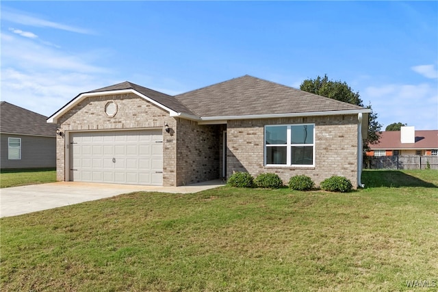 single story home with a garage and a front yard