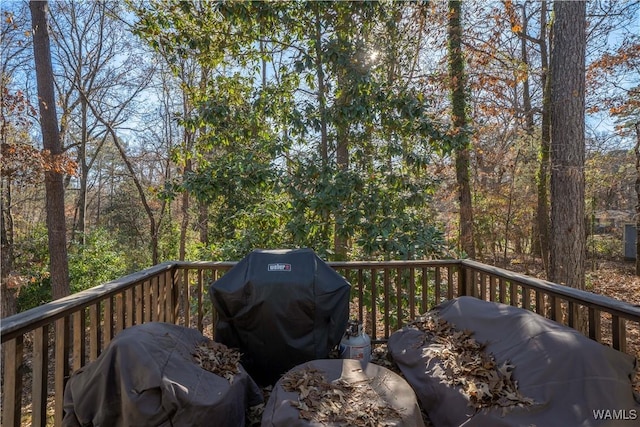 wooden deck featuring grilling area