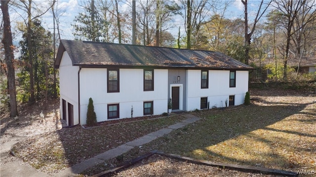 raised ranch featuring a garage