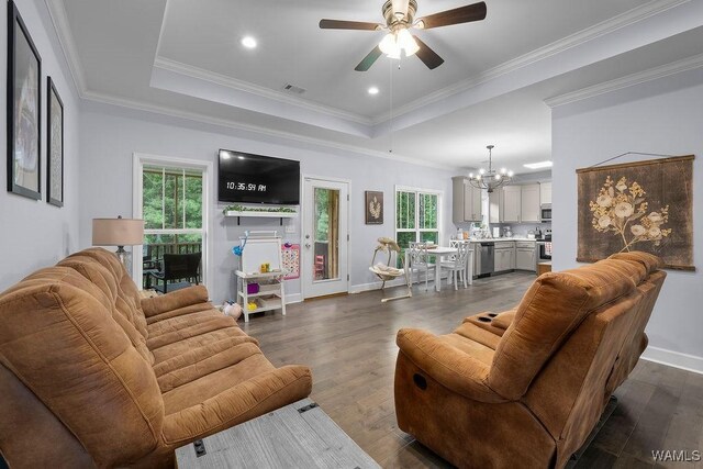 19026 Eastern Valley Rd, West Blocton, AL 35184 - living area featuring a chandelier, ceiling fan, a raised ceiling, dark wood-style floors, and baseboards
