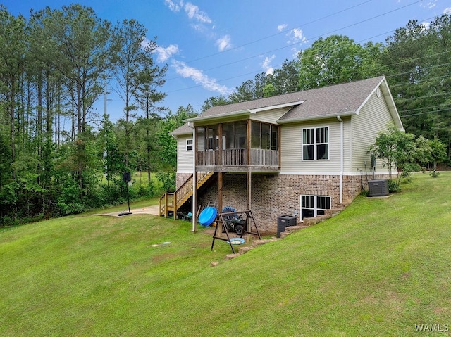 19026 Eastern Valley Rd, West Blocton, AL 35184 - rear view of house with a sunroom, stairs, a yard, and central AC unit
