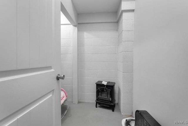 19026 Eastern Valley Rd, West Blocton, AL 35184 - detailed view of a wood stove and concrete flooring