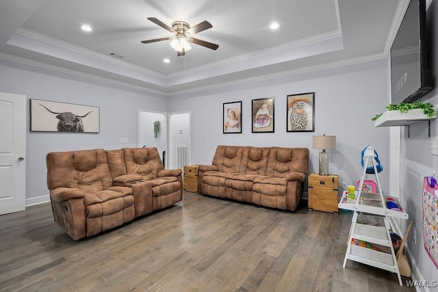 19026 Eastern Valley Rd, West Blocton, AL 35184 - living area featuring a raised ceiling, ceiling fan, wood finished floors, ornamental molding, and recessed lighting