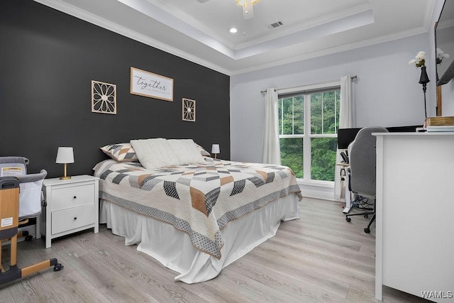 19026 Eastern Valley Rd, West Blocton, AL 35184 - bedroom featuring light wood-type flooring, a raised ceiling, a desk, crown molding, and recessed lighting
