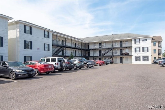 1009 12th St Unit 19, Tuscaloosa, AL 35401 - view of apartment building / complex with uncovered parking and stairway