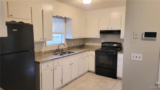 kitchen featuring sink, black appliances, light tile patterned floors, white cabinets, and range hood