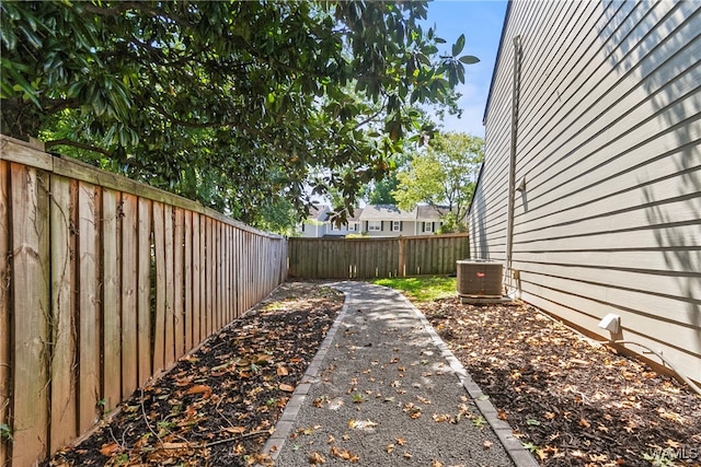 view of yard featuring central AC