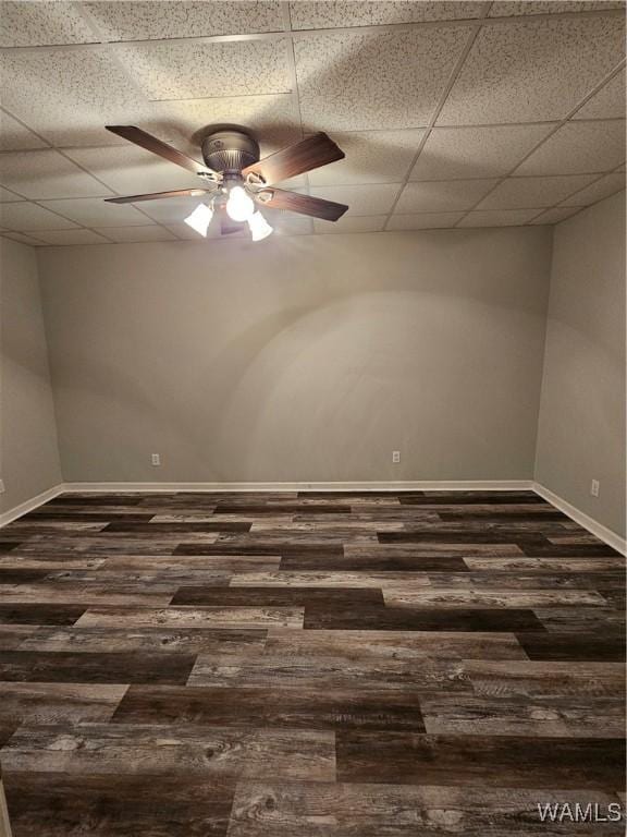 14541 Keenes Mill Rd, Coaling, AL 35453 - spare room with dark wood finished floors, a drop ceiling, baseboards, and a ceiling fan