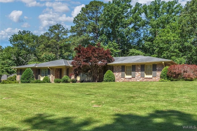 5204 Dove Creek Ave, Northport, AL 35473 - ranch-style home featuring a front yard and brick siding