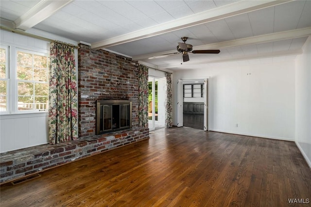5204 Dove Creek Ave, Northport, AL 35473 - unfurnished living room with beam ceiling, a ceiling fan, wood finished floors, a fireplace, and baseboards