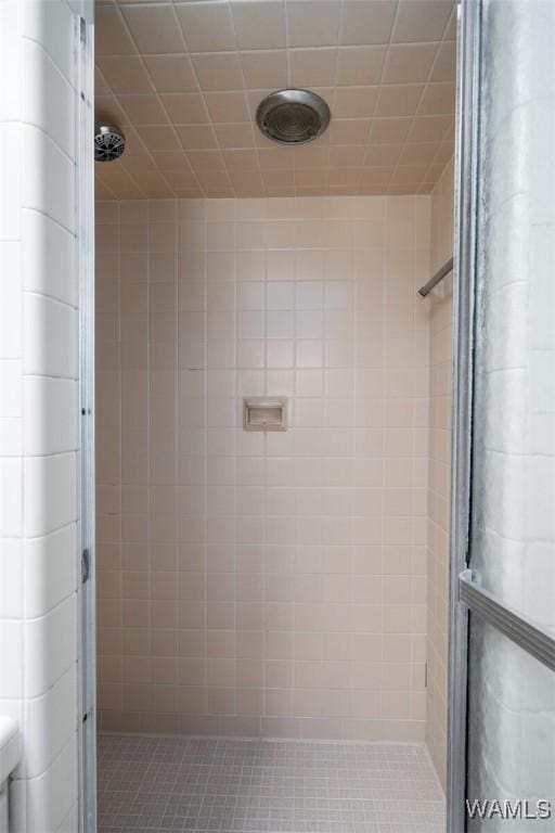 5204 Dove Creek Ave, Northport, AL 35473 - bathroom with a shower stall and tile patterned flooring
