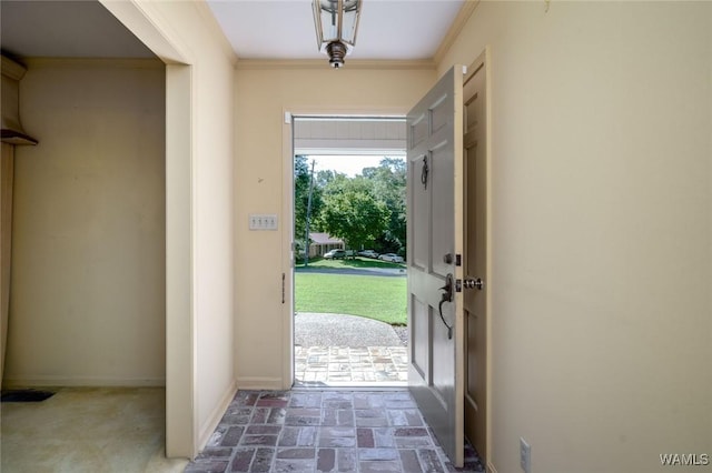 5204 Dove Creek Ave, Northport, AL 35473 - foyer featuring brick floors, baseboards, and ornamental molding