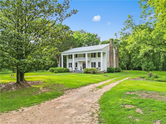 exterior space featuring a lawn