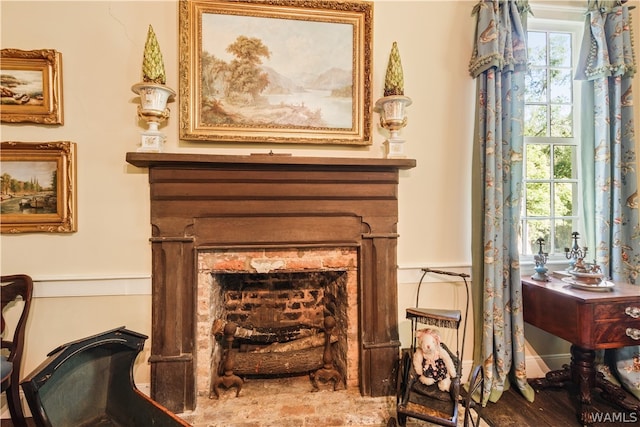 sitting room with wood-type flooring and a wealth of natural light