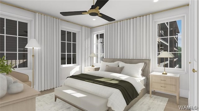 bedroom with recessed lighting, wood finished floors, and a ceiling fan