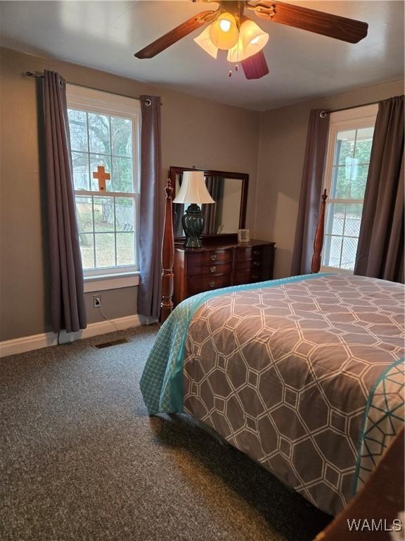 bedroom with access to outside, ceiling fan, and carpet floors