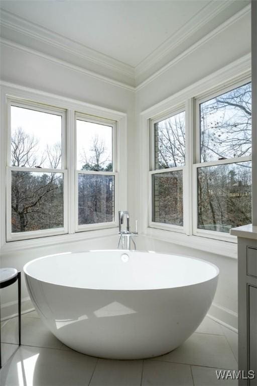 1901 Point Clear Rd, Tuscaloosa, AL 35406 - bathroom with crown molding, tile patterned flooring, a freestanding bath, and vanity